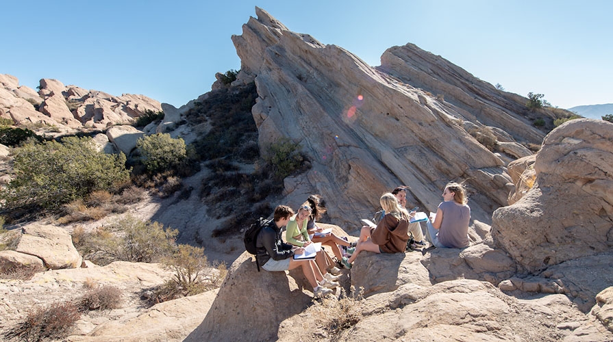 Geology students at Vasquez Rocks outside LA, taking notes in the field