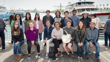 a group of students togther on a field trip to the Port of LA