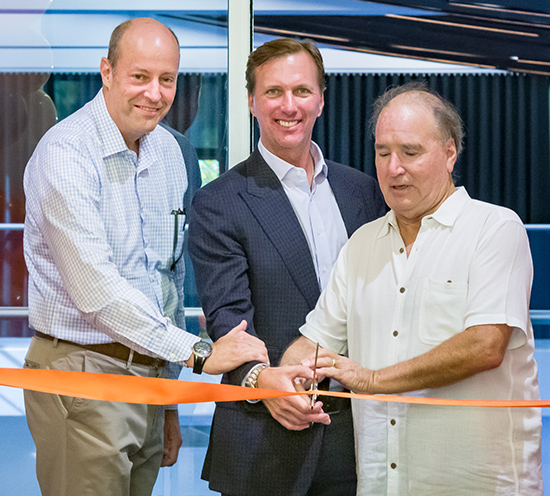 Then-President Jonathan Veitch, Ian McKinnon ’89, and Shearer at the dedication of the Derek Shearer Conference Room in 2019.