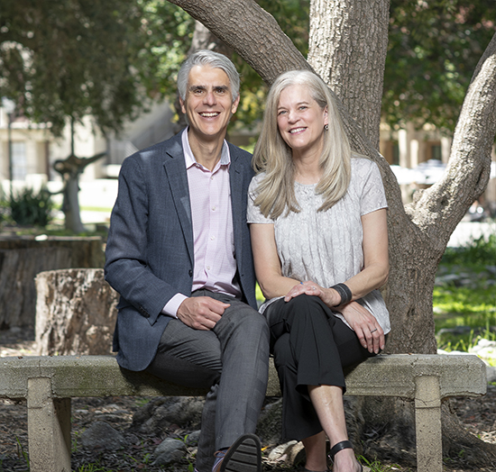 Stritikus and Pfeifer in the College’s Olive Grove.