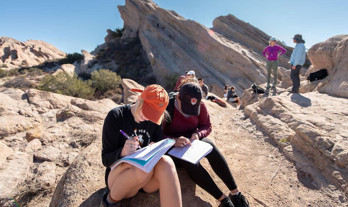 Two Oxy students doing geology research in the field at Vasquez Rocks outside of LA