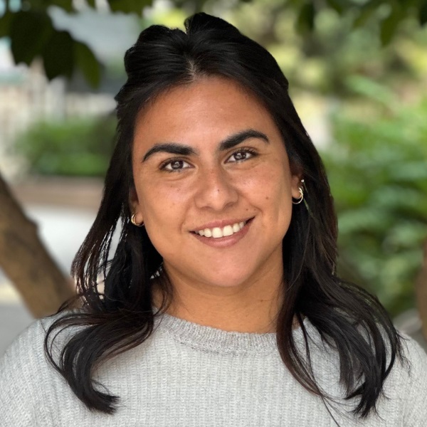 Woman in front of plants
