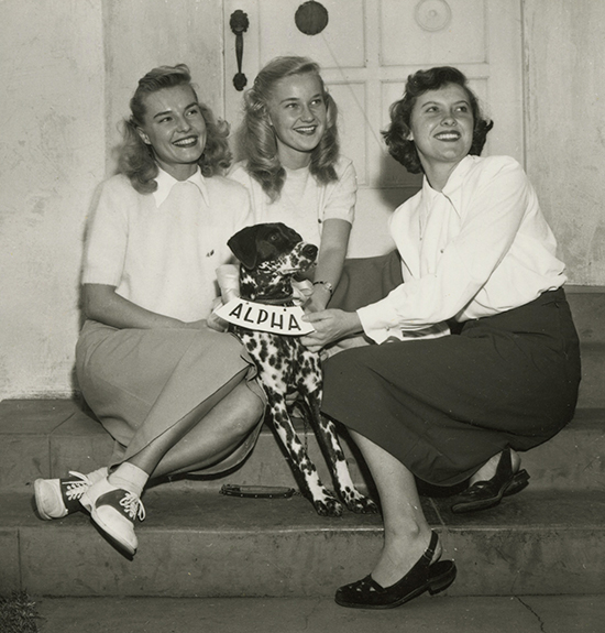 Alpha sisters with their dog pledge, Suzie, in October 1948.