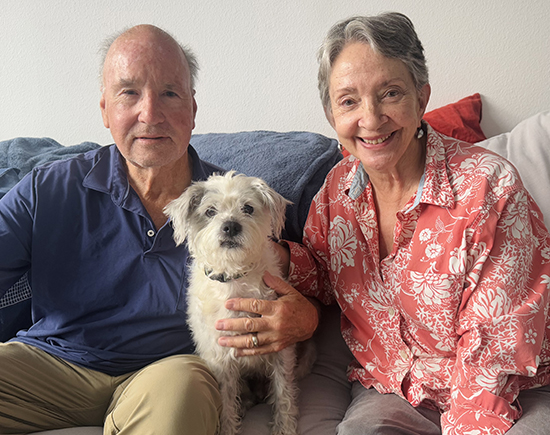 With his wife, Sue, and “ambassadog,” Wyatt, at their Pacific Palisades home.