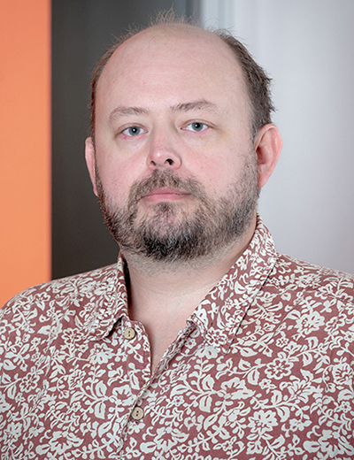 Eric Bjorklund headshot with collared shirt