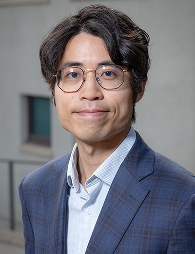 Kai Yui Samuel Chan headshot with blue blazer