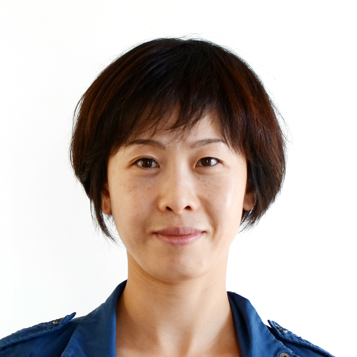 Woman in front of white background