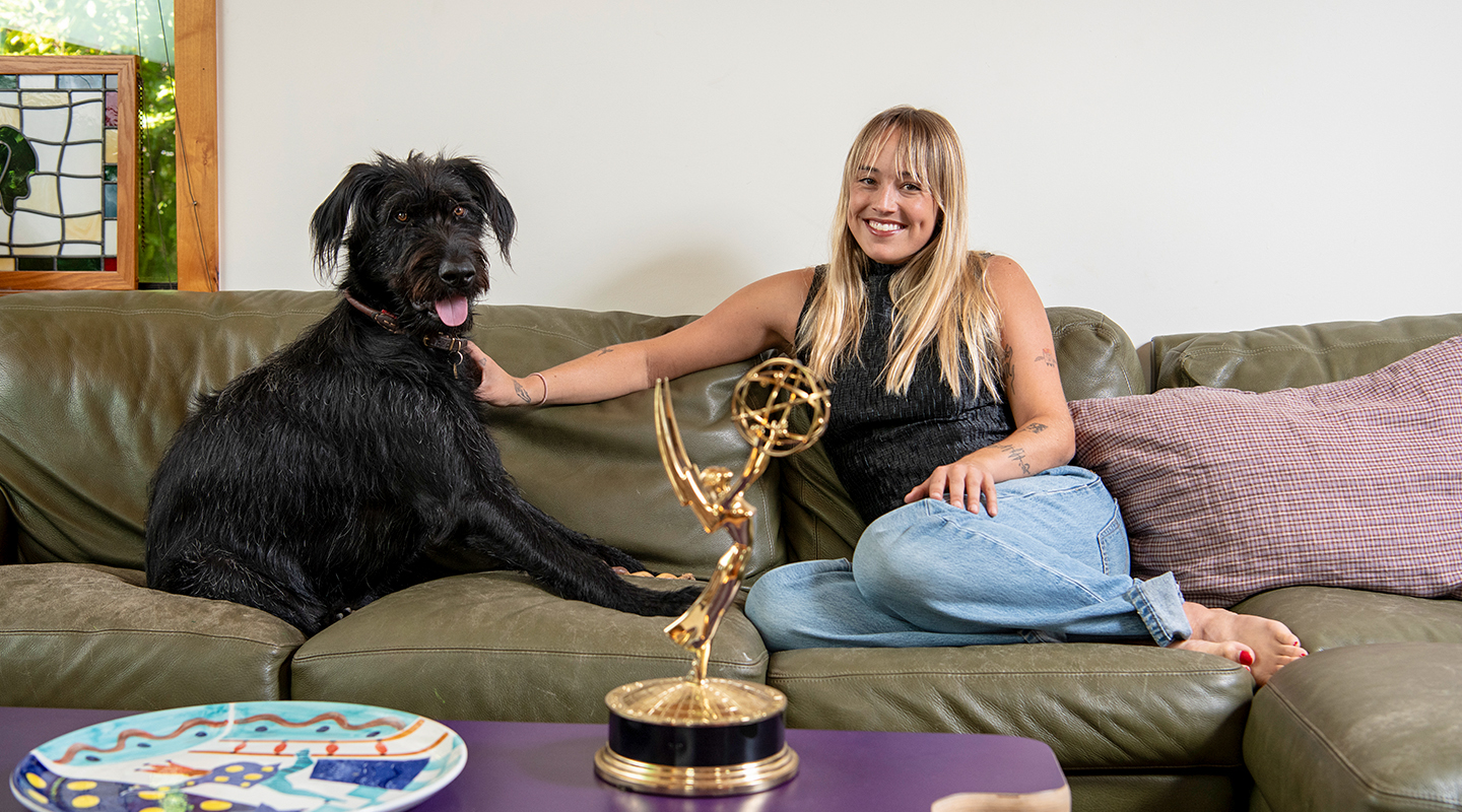 Two-time Emmy winner Emma Choate ’20 with her 2-year-old Irish wolfhound, George.