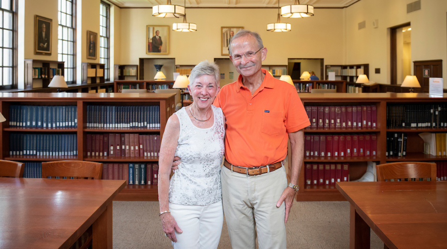 Portrait of Barbara and Michael Gibby in the Occidental College library