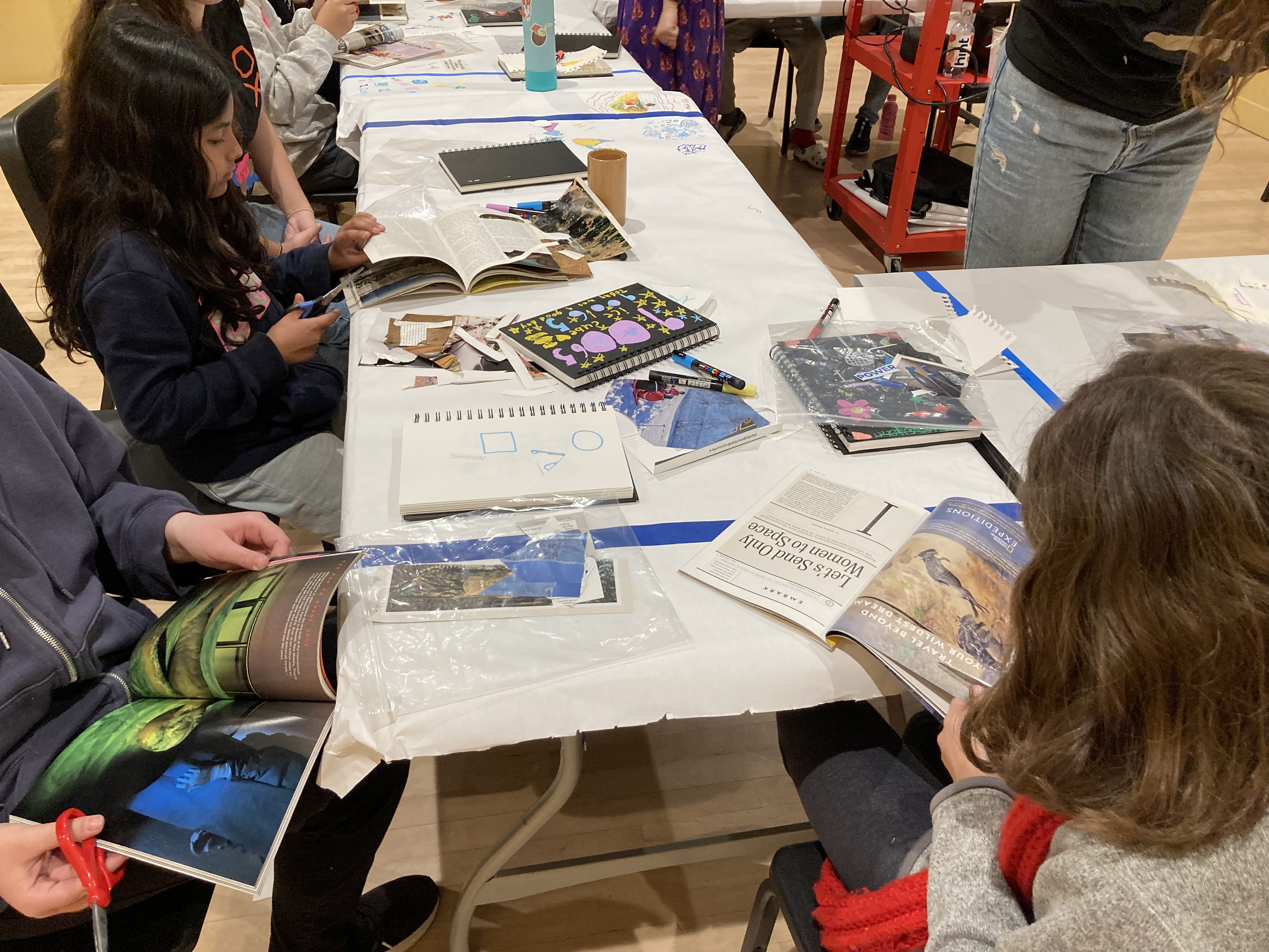 IMG_3517.jpg Students collaging at a table together