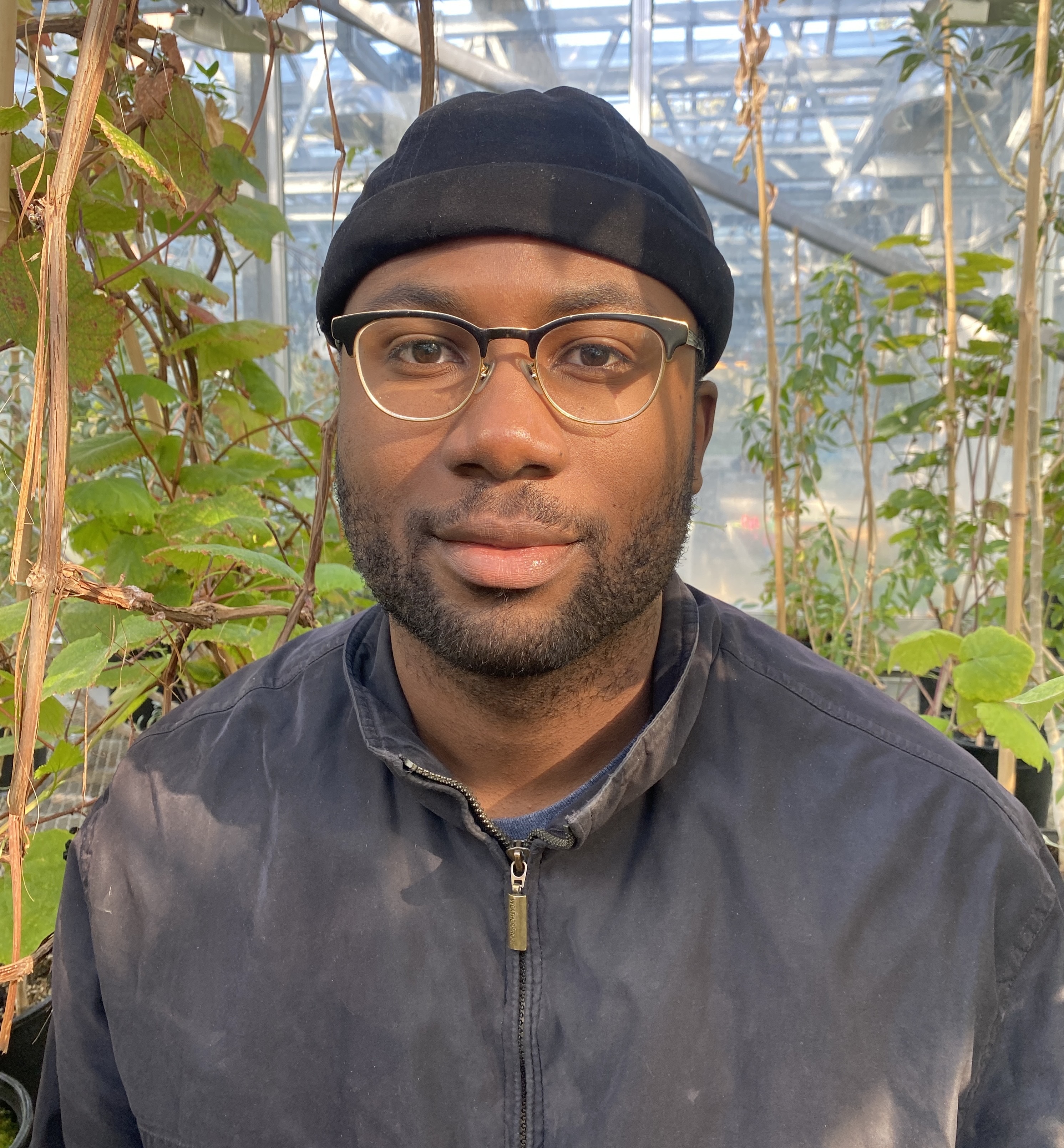 Marvin Browne in front of plants