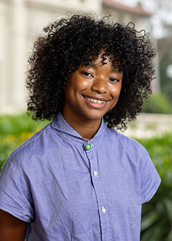 Jade Crichlow headshot light blue shirt