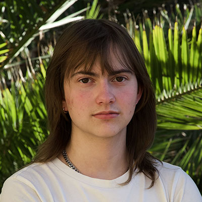 Jay Ward headshot white tshirt, brown hair
