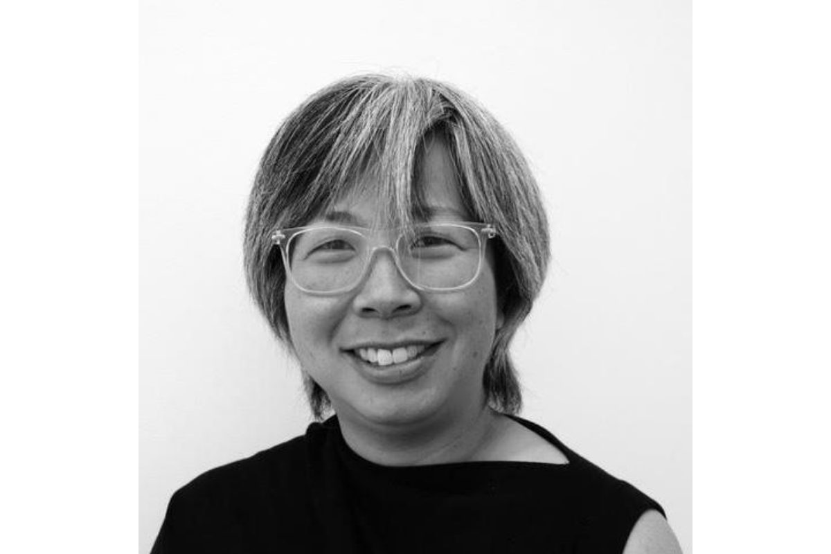 Black and white portrait of Kris Kuramitsu