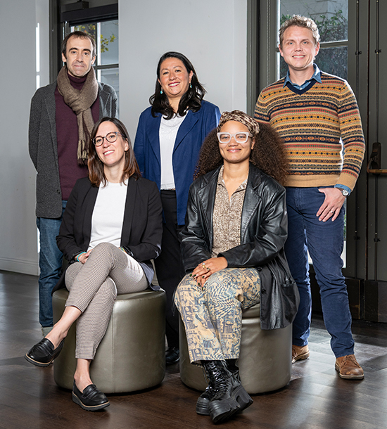 Standing, l-r: Associate professors Alberto Lopez Martin (Spanish), Carla Macal (critical theory and social justice), and Dusty Madison (physics). Seated: Manuela Borzone (Spanish and French studies) and Summer Sloane-Britt (art and art history).