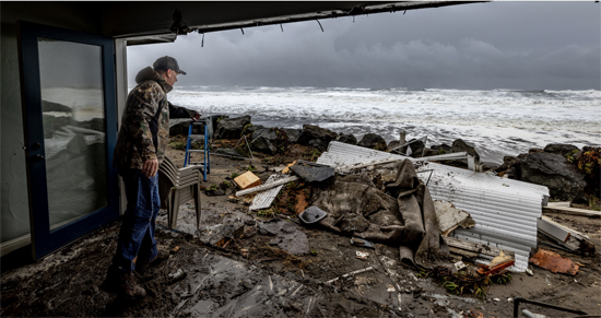 Ocean swells knocked out the front wall of Eric Stark’s oceanfront home in Rio Del Mar on January 5. Photo by Kevin Painchaud Ocean swells knocked out the front wall of Eric Stark’s oceanfront home in Rio Del Mar on January 5. Photo by Kevin Painchaud