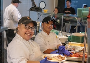 occidental cafeteria staff serving food to occidental students