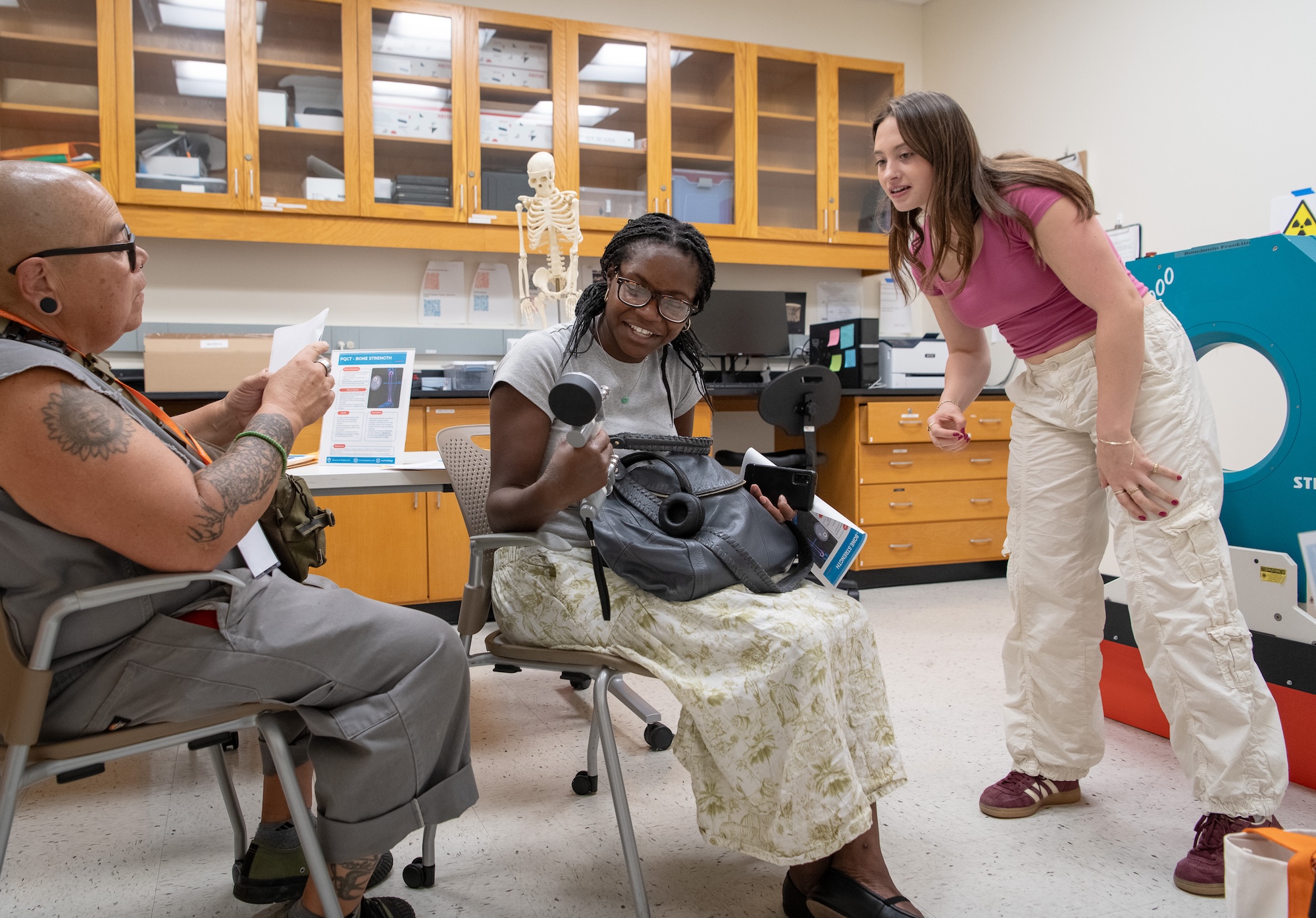 Attendees at the Kinesiology Department during the Faculty Lab Crawl at Homecoming & Family Weekend.