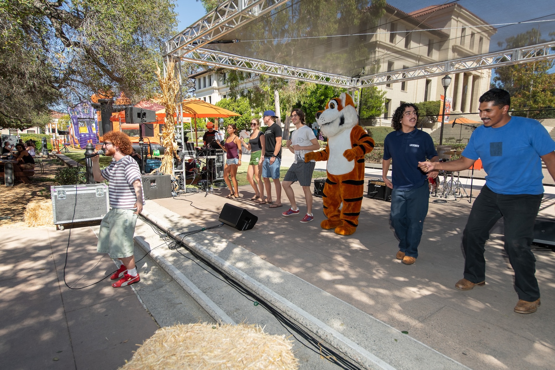 Students dancing at Oswald's Harvest Festival at Homecoming and Family Weekend