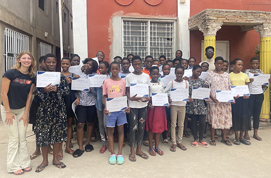 Projects for Peace participants Eleanor Goddard ’25 and Stephen Amankonah Sekyere ’27 at a middle school in Ghana Projects for Peace participants Eleanor Goddard ’25 and Stephen Amankonah Sekyere ’27 at a middle school in Ghana