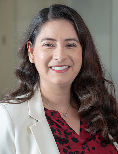 Alyssa Rodriguez headshot with white blazer