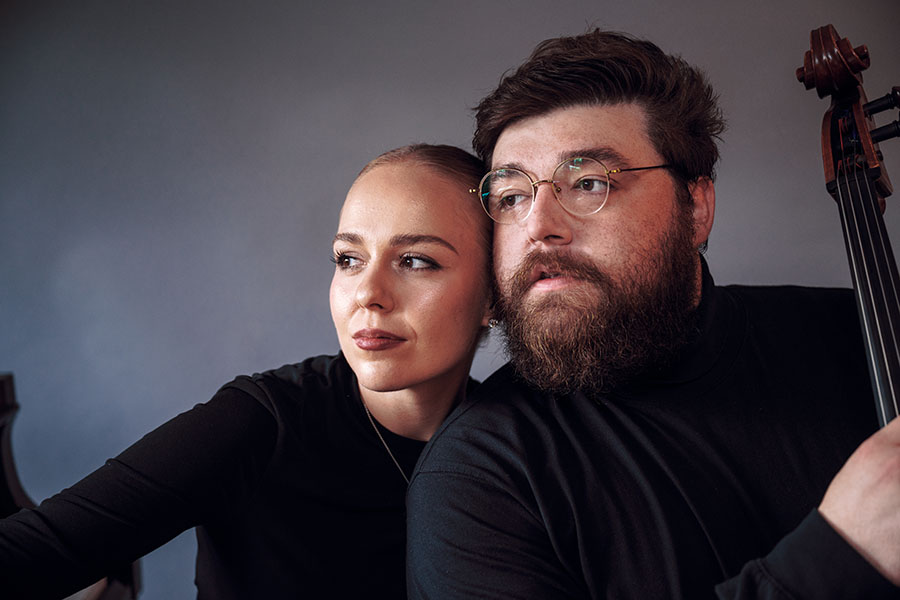 cellist Ryan Phipps and pianist Anastasia Maksiuta in black 