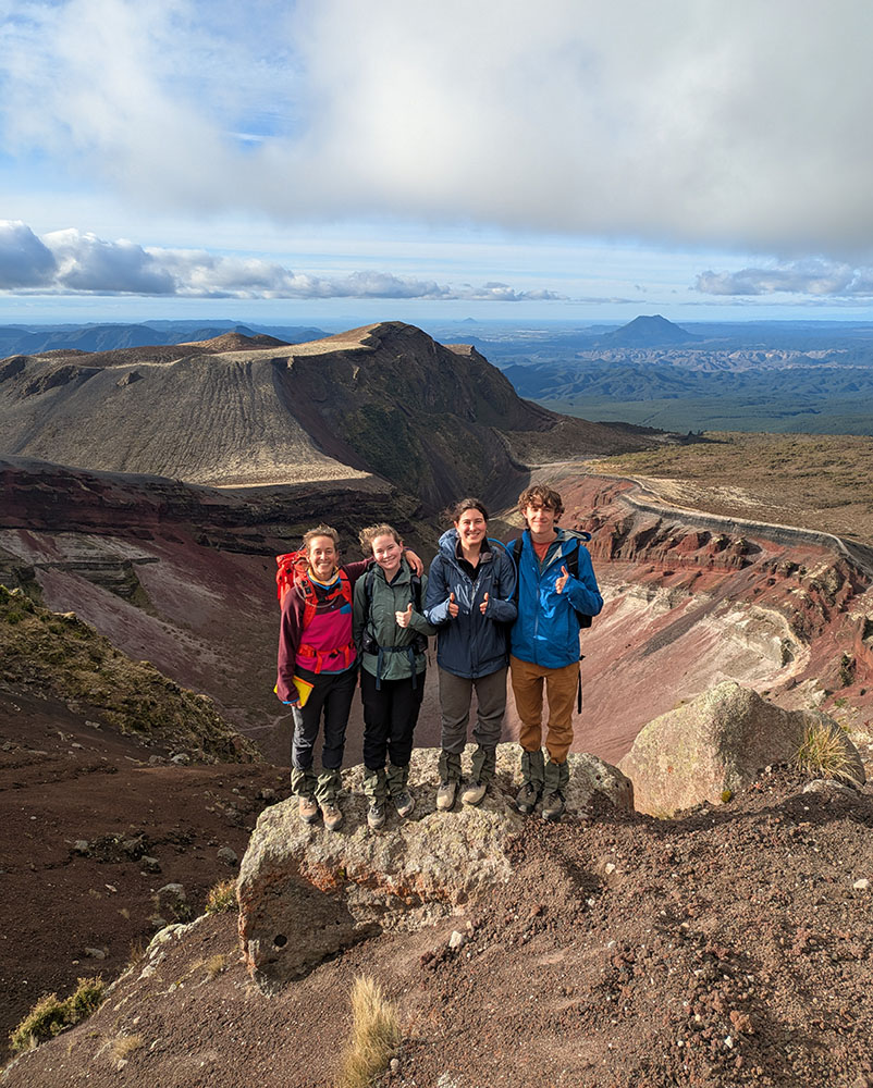 Oxy students and their professor doing geology research in the mountains of New Zealand