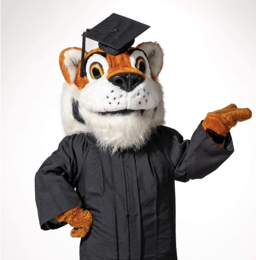 Oswald in a cap and gown