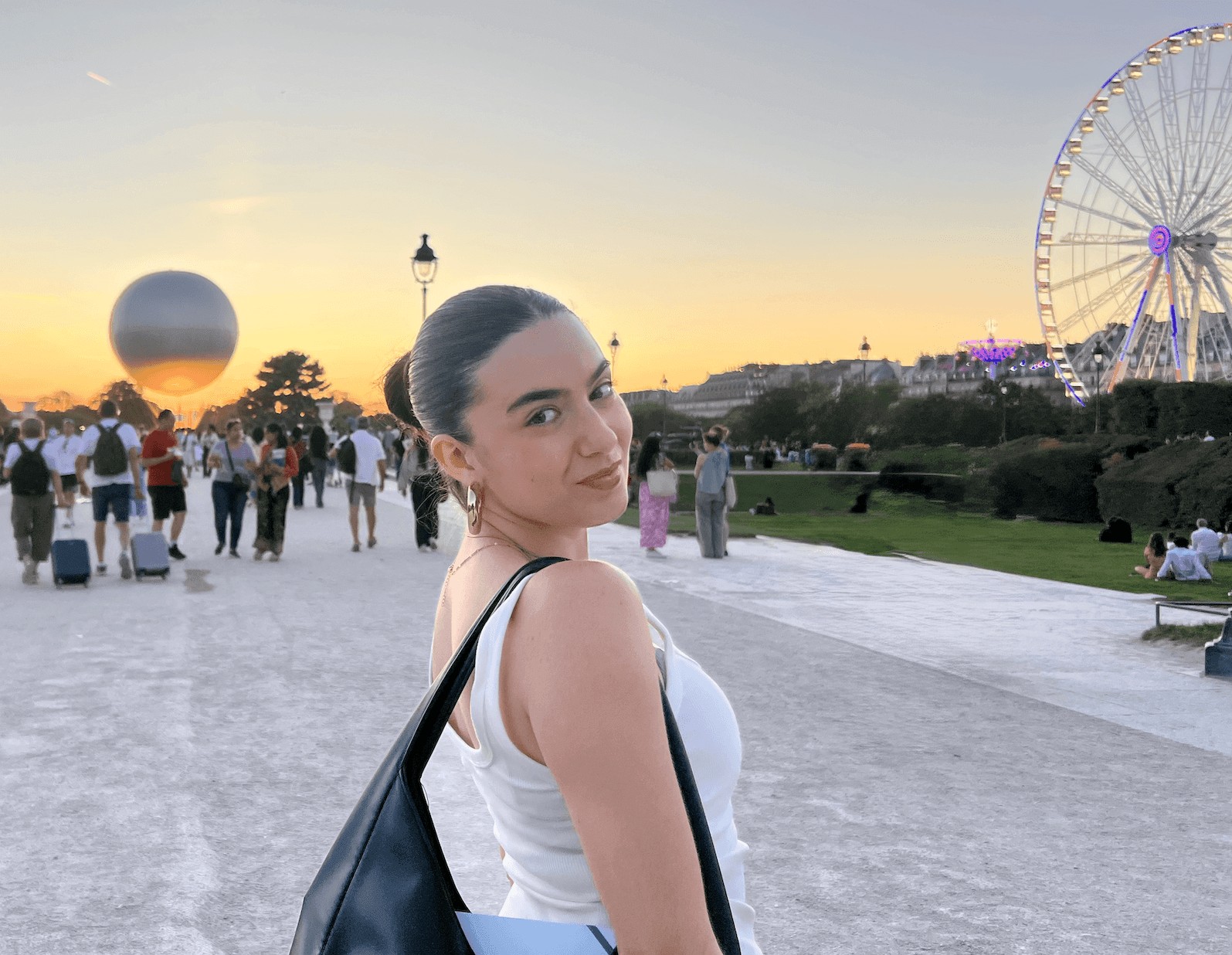 Selma at the Tuileries Garden with a Ferris wheel in the background
