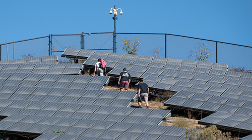 Students in Assistant Professor Aleem Hossain’s 360 video class gather footage using 360-degree video cameras at the solar array on Fiji Hill on Oct. 21, 2019. Students in Assistant Professor Aleem Hossain’s 360 video class gather footage using 360-degree video cameras at the solar array on Fiji Hill on Oct. 21, 2019.