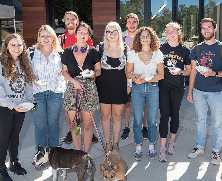 students posing in front of HCC