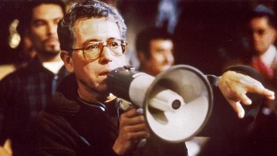 Trevino.jpg Jesús Salvador Treviño Directing Resurrection Blvd. Jesús wears glasses and stands with a megaphone, speaking to someone outside of the image frame.