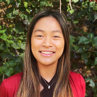 Vivian Sun headshot pink sport coat