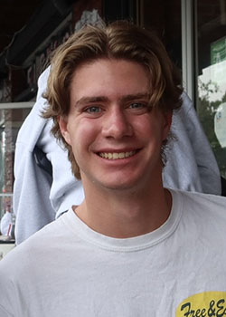 Warren Cruser headshot white tshirt