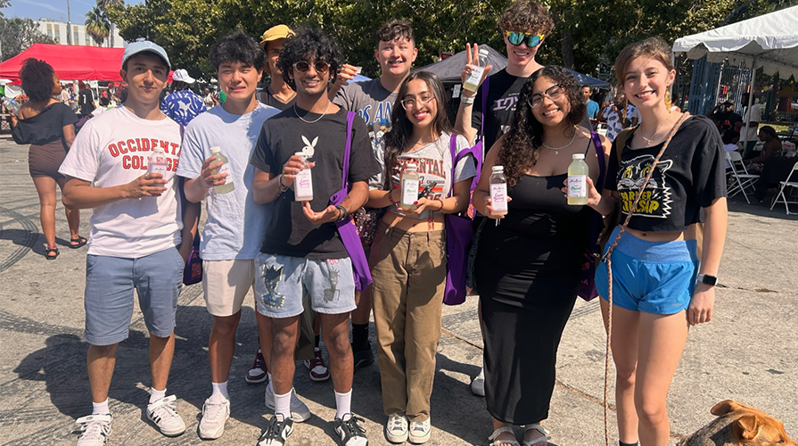 Yemale Febres '27 with the 2023 MSI cohort, standing together and smiling in the sunshine