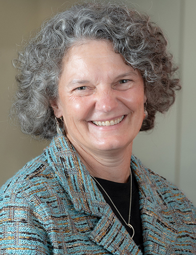 Vanessa Yingling headshot with blue blazer coat