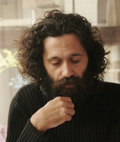 Gil Anidjar headshot in black turtleneck