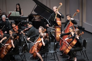 Photograph of the Occidental Symphony Orchestra performing on the Thorne Hall stage