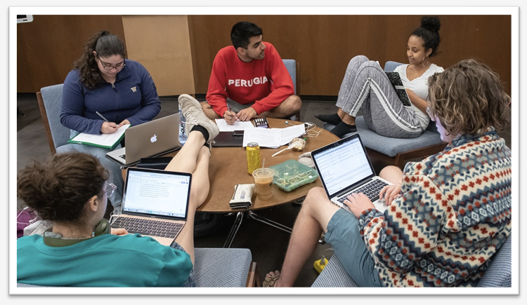 Students gathered around a table