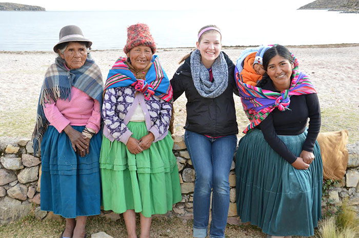 Oxy Student Theresa Edwards with her host mom and two other 