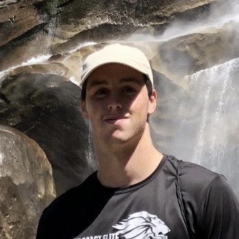A headshot of Occidental College student Kyle 