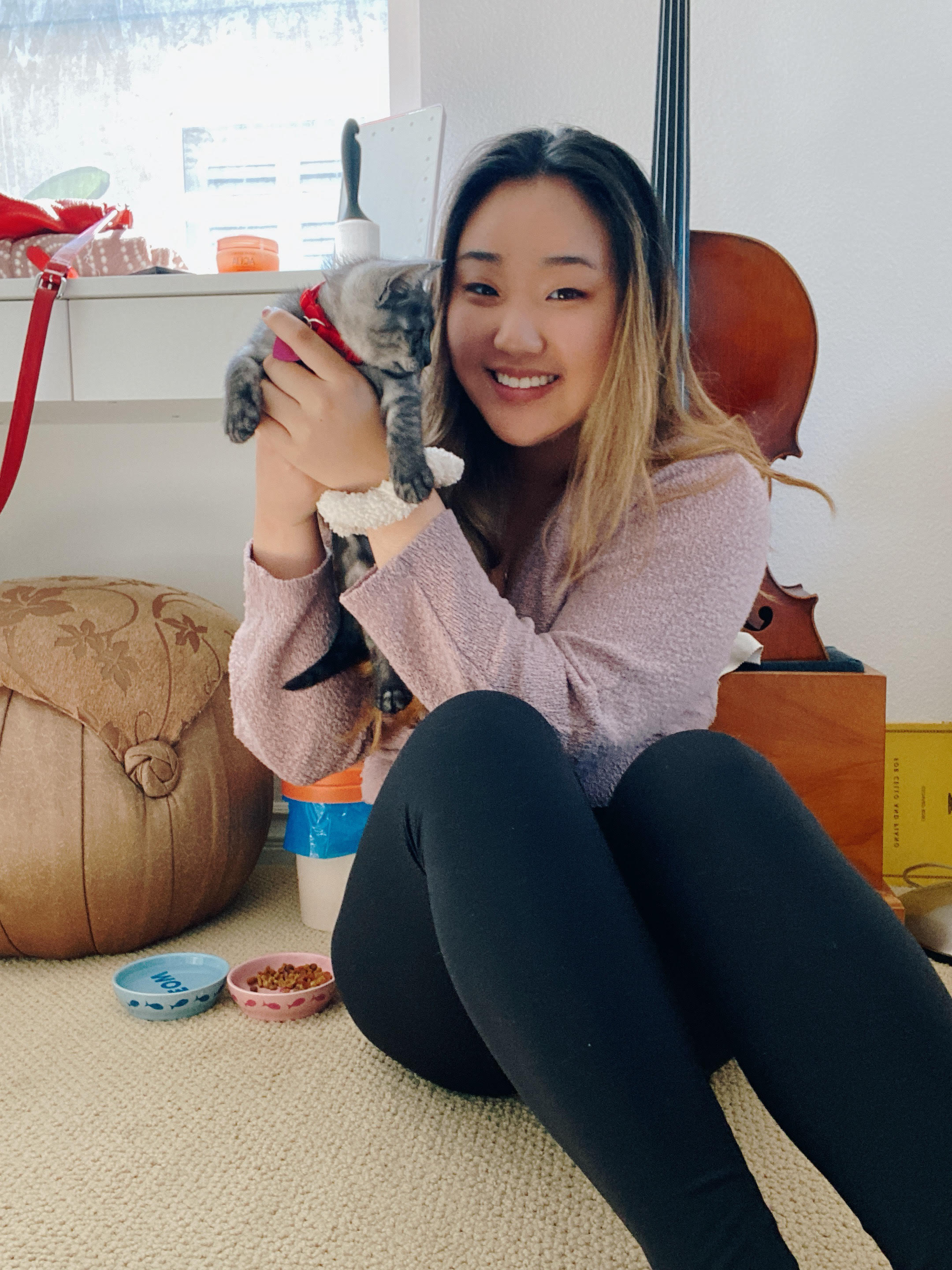 Tiffany Kim holding a cat
