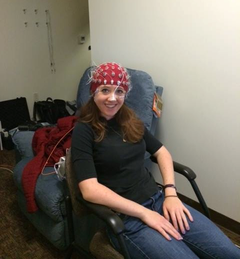 Sarah Charney, Class of 2015, demonstrating our EEG equipmen