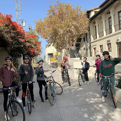 A group of occidental students using bikes
