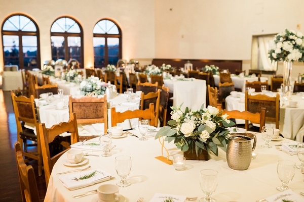 The Occidental campus main dining room set up with formal place settings and flowers