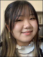 a young Asian woman with long hair and bangs