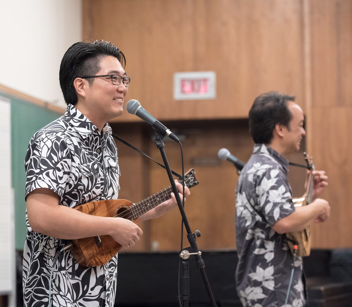 Jason Arimoto and Daniel Ho perform for students