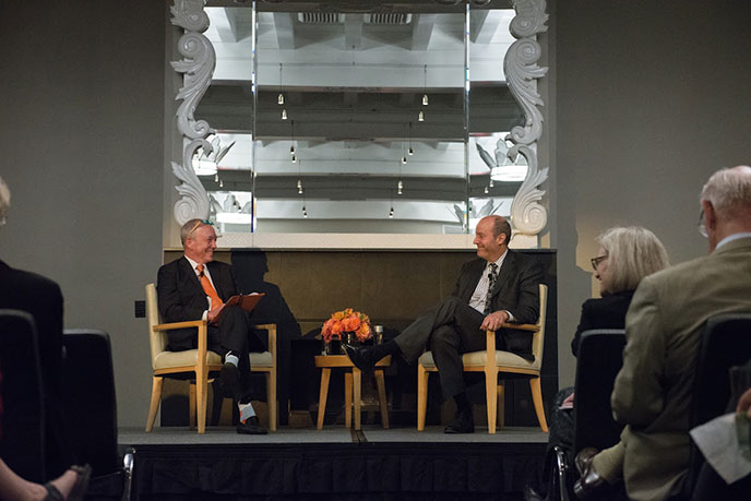 President Veitch with Ted Mitchell at a fireside chat in Was