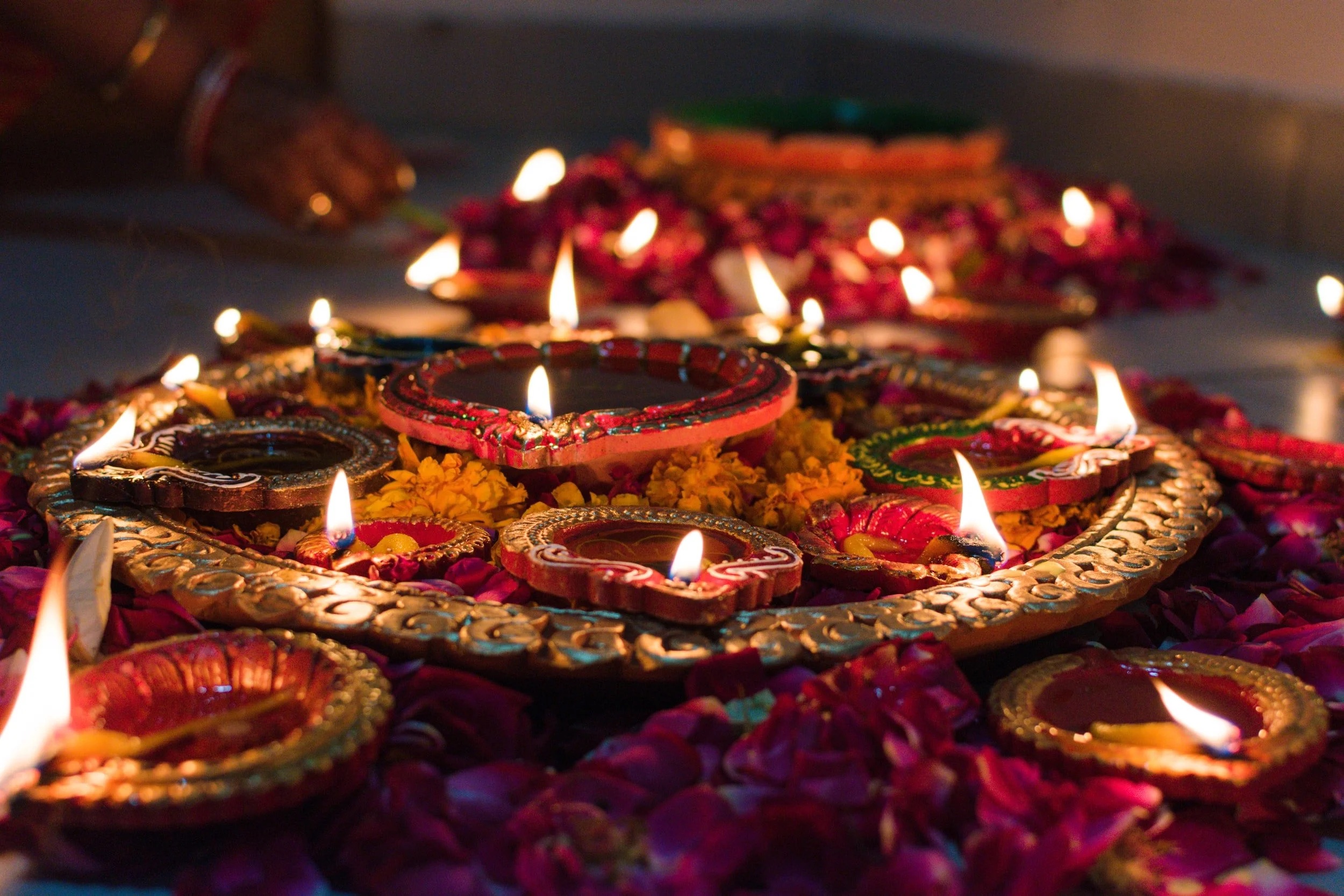 Stock image of diyas (candles) lit for Diwali