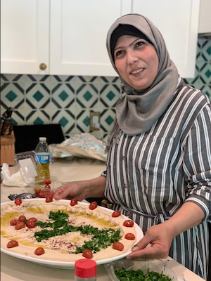 Miry's List Miry presents a plate of food in a kitchen